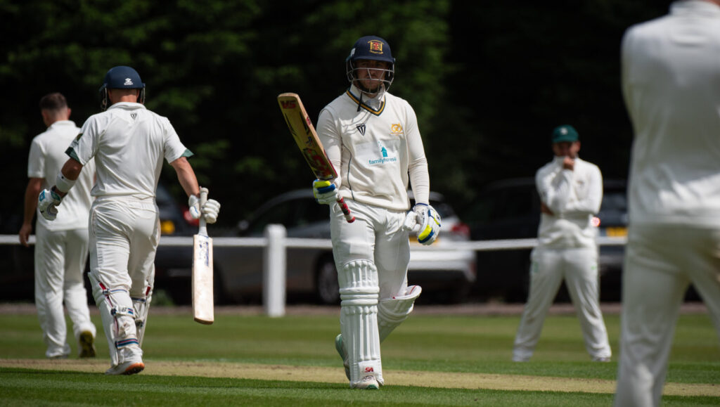 Staffordshire County Cricket Club's Matthew Morris celebrates reaching his half-century against Buckinghamshire.