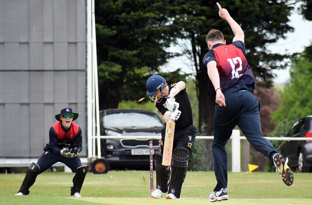 Staffordshire opener Callum Hawkins is bowled by Herefordshire seamer James Rudge.