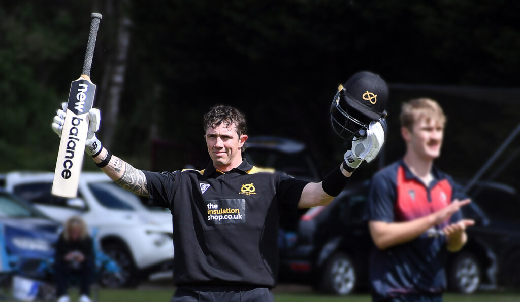 Staffordshire County Cricket Club's James Kettleborough celebrates his century against Herefordshire