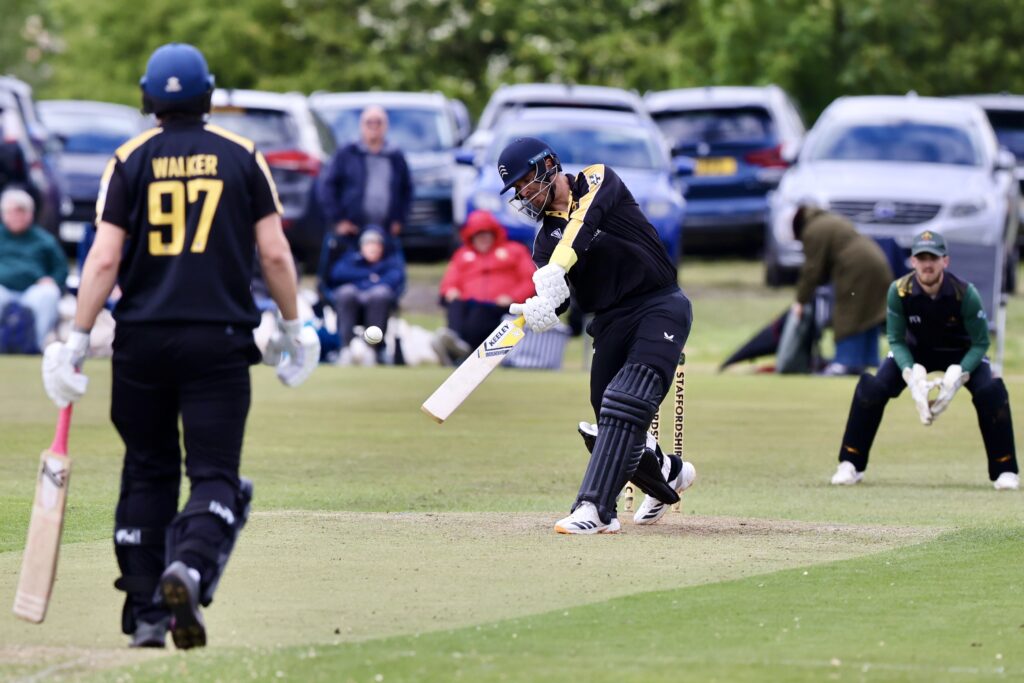 Staffordshire's Dan Lincoln goes on the attack in his big-hitting innings.