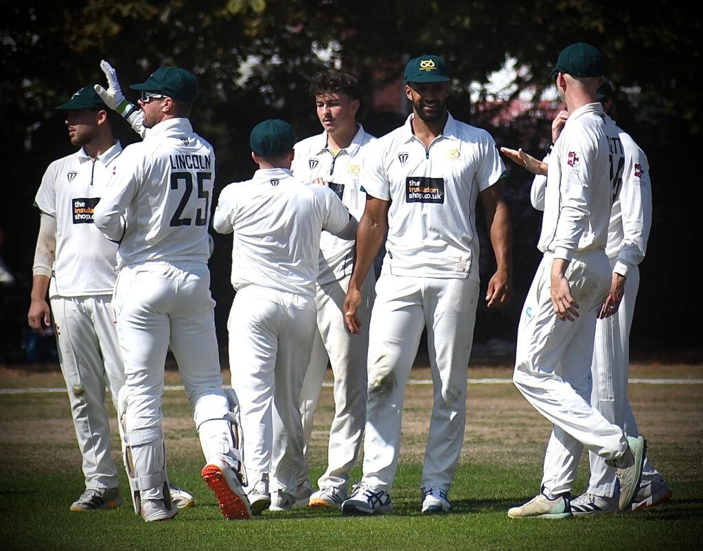 Staffordshire celebrate taking a Suffolk wicket.