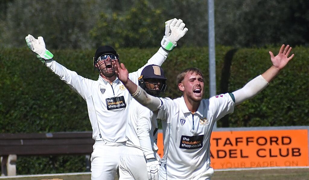 Staffordshire's Sam Atkinson appeals for a Suffolk wicket.
