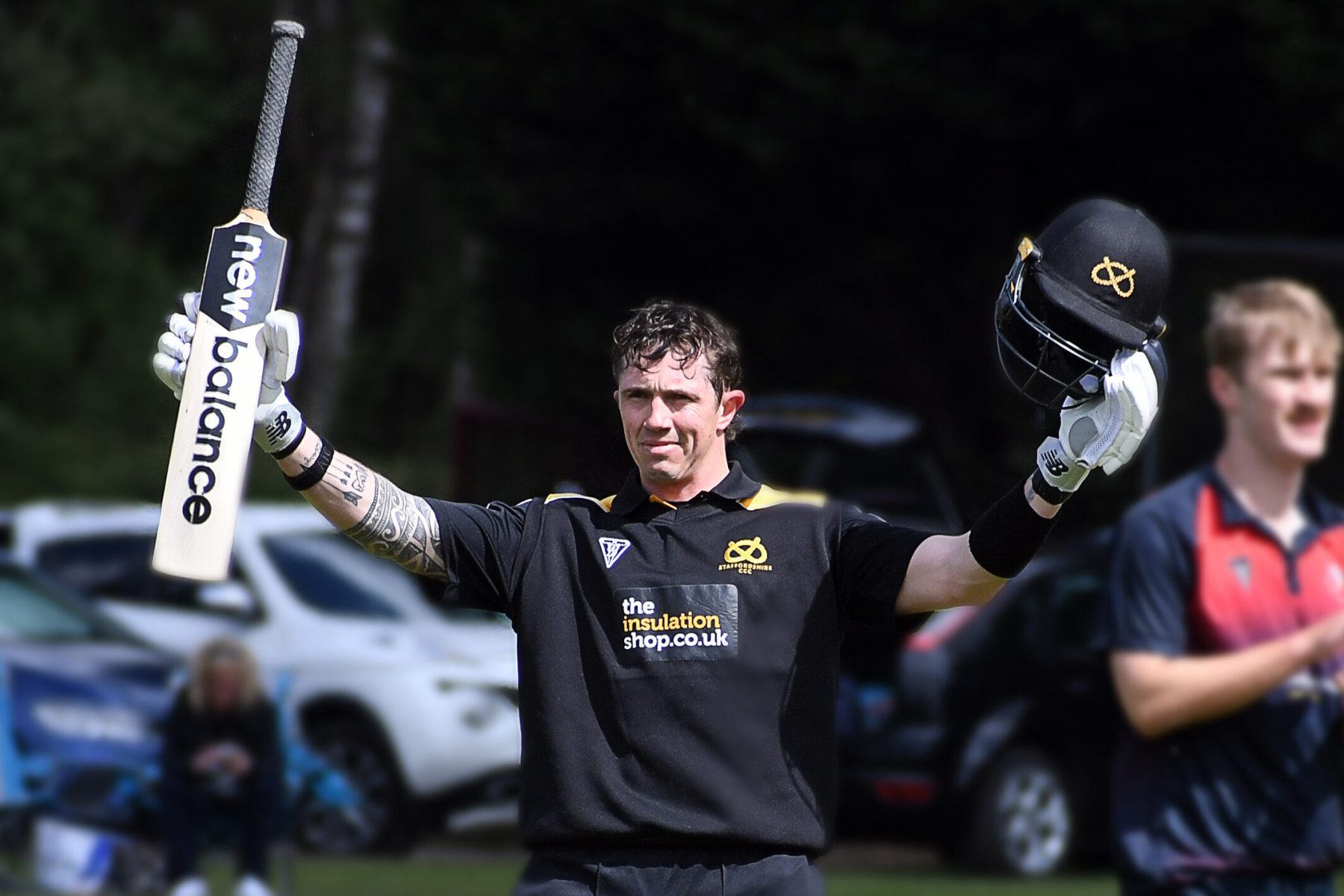 Staffordshire captain James Kettleborough celebrates reaching century against Herefordshire at West Bromwich Dartmouth.