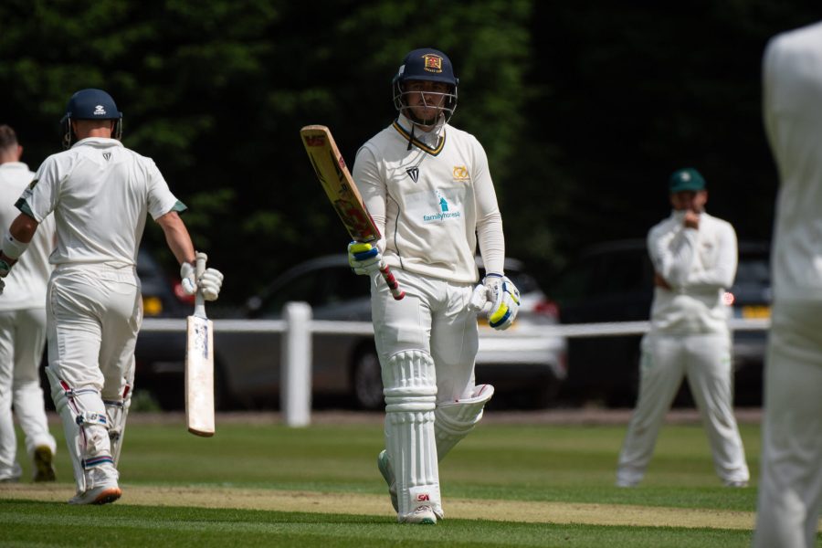 Staffordshire County Cricket Club's Matthew Morris celebrates reaching his half-century against Buckinghamshire.