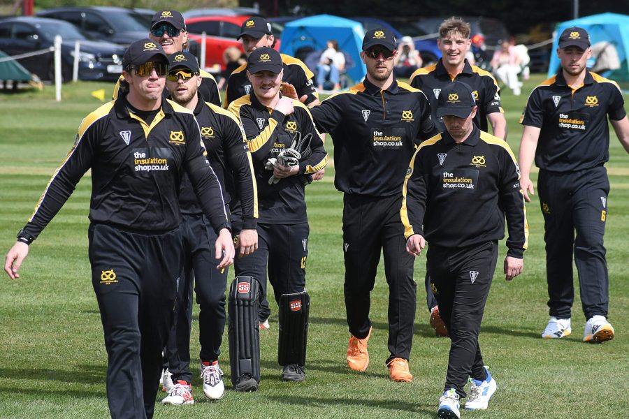 Staffordshire County Cricket Club captain James Kettleborough leads the players off the pitch after fielding against Norfolk