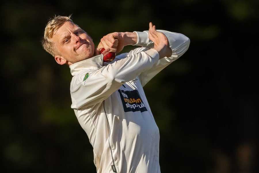 Staffordshire spinner Tom Brett bowls in the NCCA Championship final