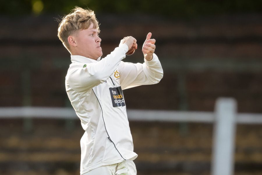 Staffordshire spinner Oliver Tucker bowls in the NCCA Championship final