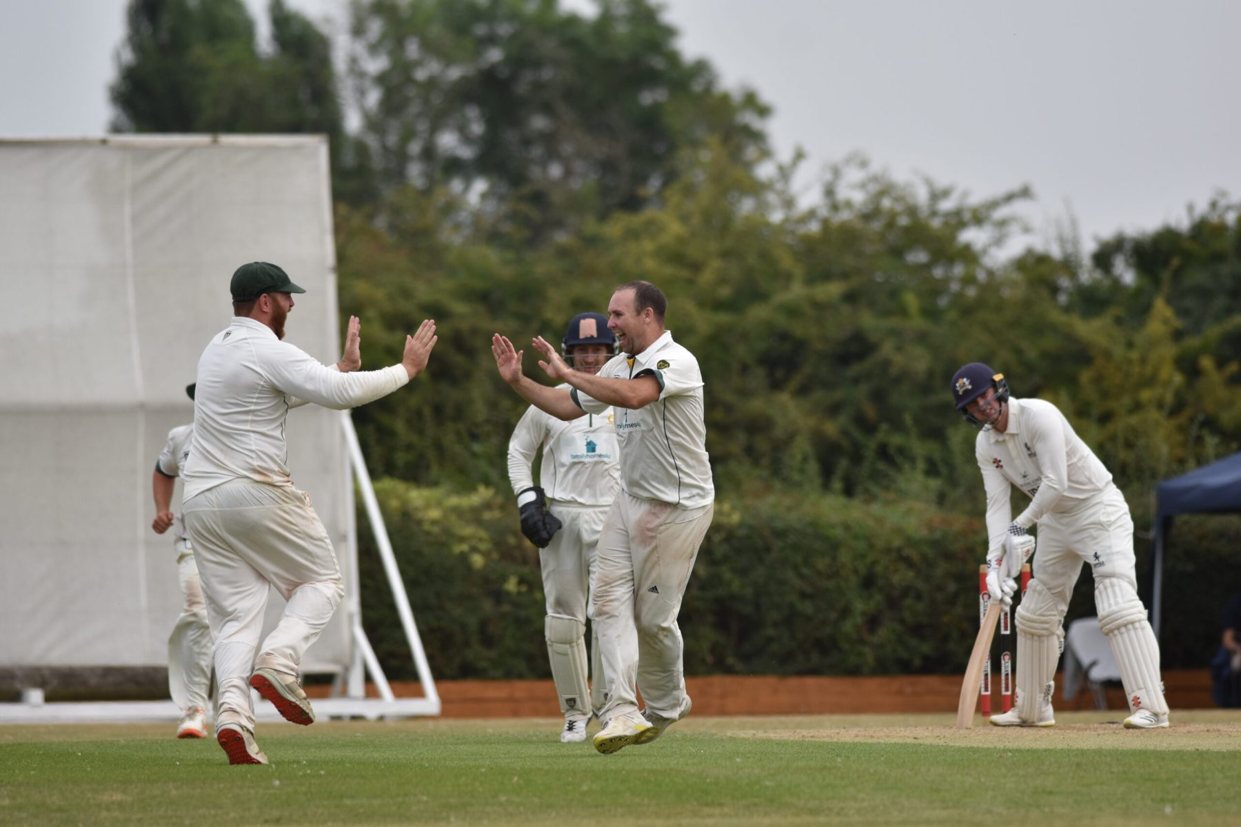 Paul Byrne celebrates a wicket on the second day against Suffolk.