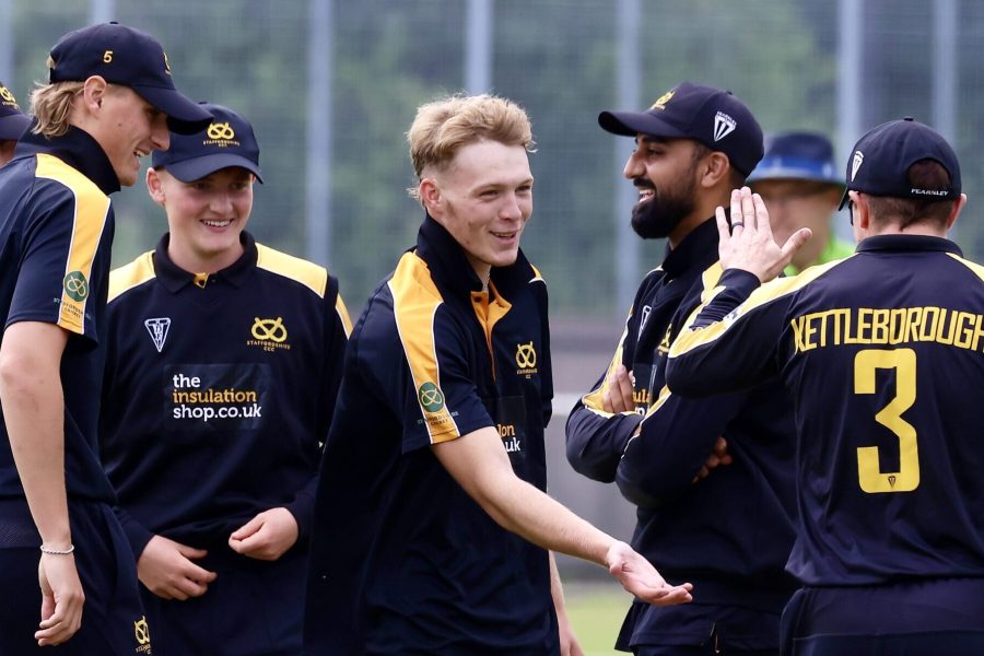 Staffordshire celebrate taking a Warwickshire wicket in the NCCA Showcase game.